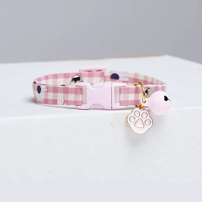 Collier réglable rose pour chat avec pendentif de patte de chat et cloche