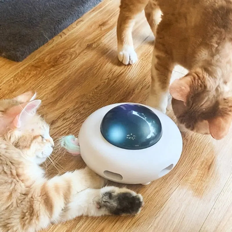 Jouet intelligent lumineux et rechargeable en forme d'ovni avec plumes pour chat